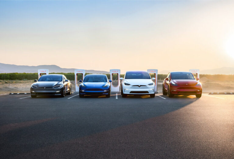 Teslas in a line scaled