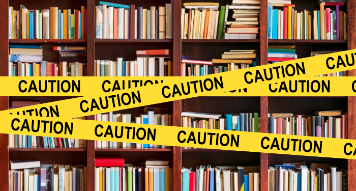 caution tape on books